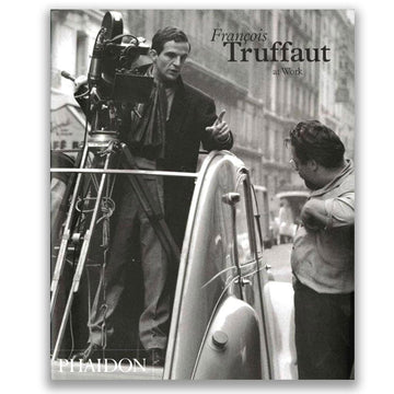 Book cover featuring a black and white photograph of a man with film equipment, titled 'François Truffaut'. Filmmaker Biography Book